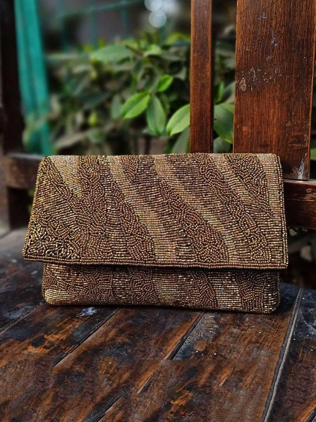 Gold Toned Embellished Clutch